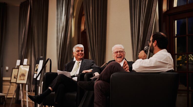 Gregory L. Fenves, Steven Fenves and Chef Alon Shaya during the March 21 dinner. To the far left you can see some of Klara’s artwork.
