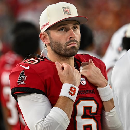 Tampa Bay Buccaneers quarterback Baker Mayfield (6) watches play against the Kansas City Chiefs in the first half an NFL football game, Saturday, Aug. 22, 2026, in Tampa, Fla. (AP Photo/Mark LoMoglio)