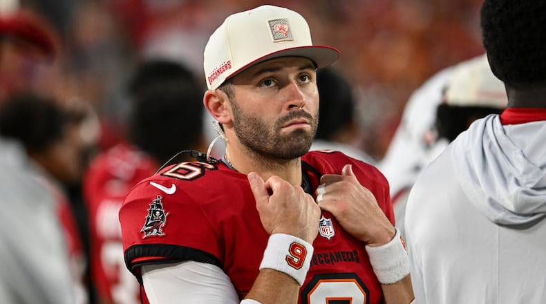 Tampa Bay Buccaneers quarterback Baker Mayfield (6) watches play against the Kansas City Chiefs in the first half an NFL football game, Saturday, Aug. 22, 2026, in Tampa, Fla. (AP Photo/Mark LoMoglio)