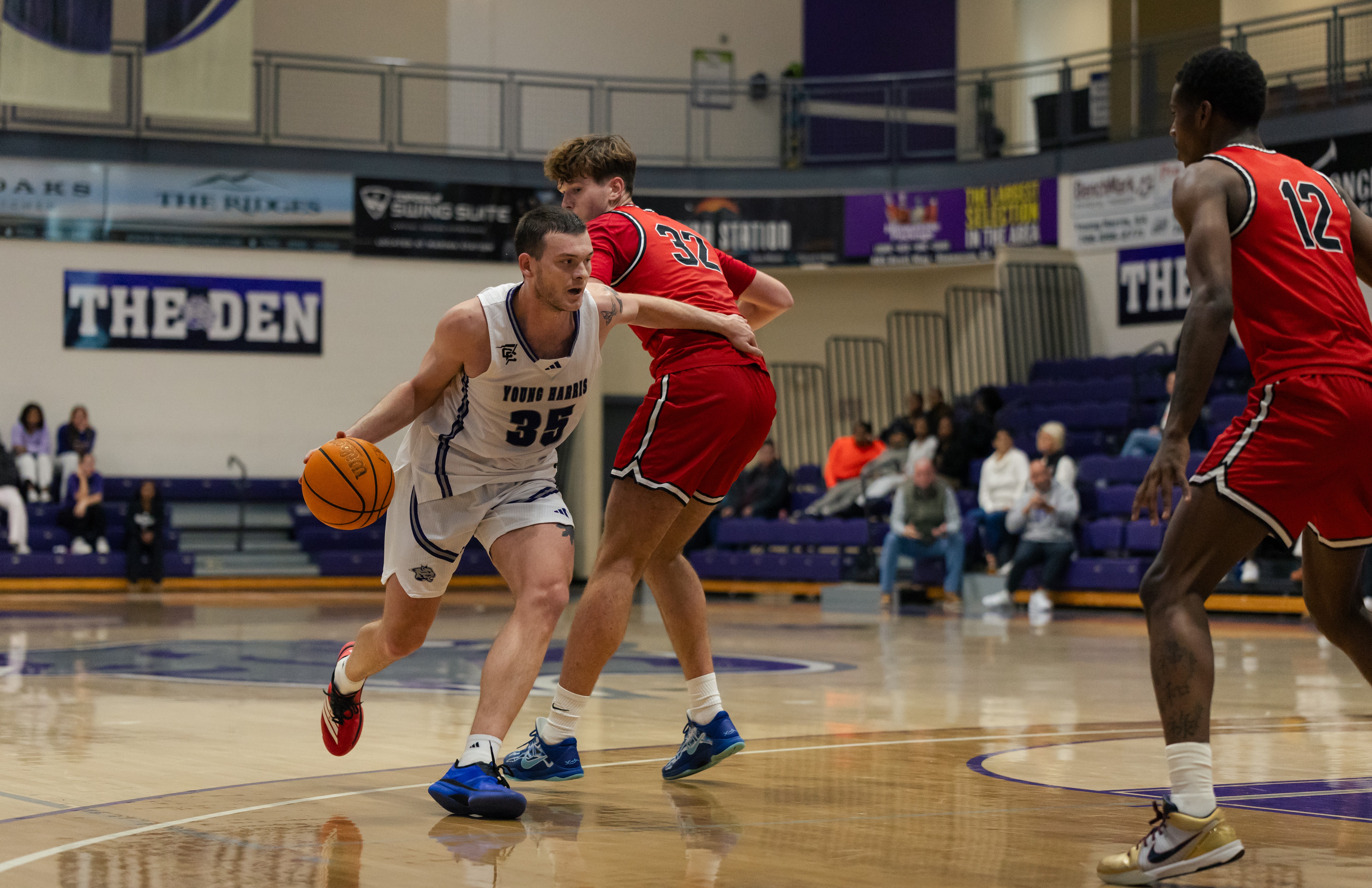 Carl Cleveland (left), a senior at Young Harris College, is the school’s all-time leading scorer. His inside-outside game makes him a tough player to defend. (Courtesy of Curtis Markham)