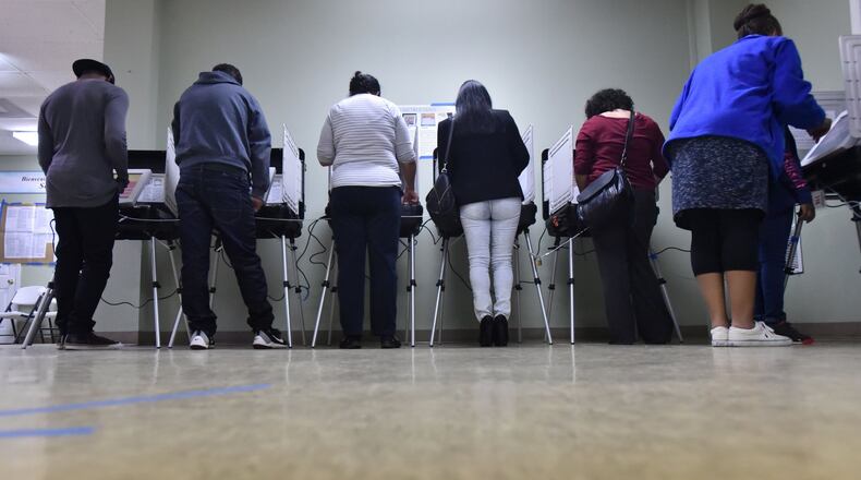 Gwinnett County residents cast their votes in 2016’s presidential election at Amazing Grace Lutheran Church in Lawrenceville. HYOSUB SHIN / HSHIN@AJC.COM