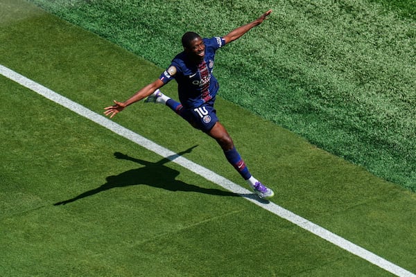 Paris Saint-Germain's Ousmane Dembele (10) celebrates after scoring during the Club World Cup semifinal soccer match between PSG and Real Madrid in East Rutherford, N.J., Wednesday, July 9, 2025. (AP Photo/Pamela Smith)