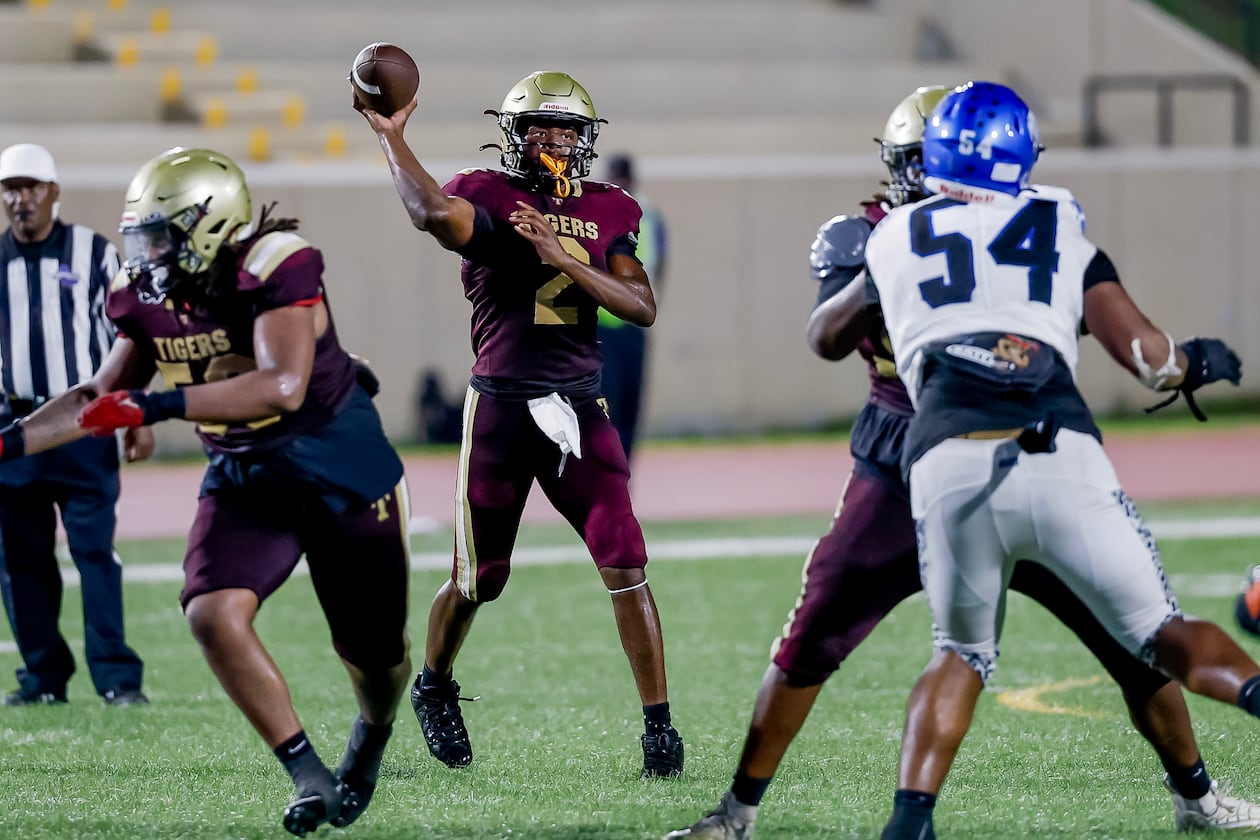 Tucker quarterback Jace German passes against Stephenson during the second half of a high school football game Hallford Stadium, Friday, Sept. 4, 2026, in Clarkston. Tucker won 21-14. (Erik S. Lesser for the AJC)