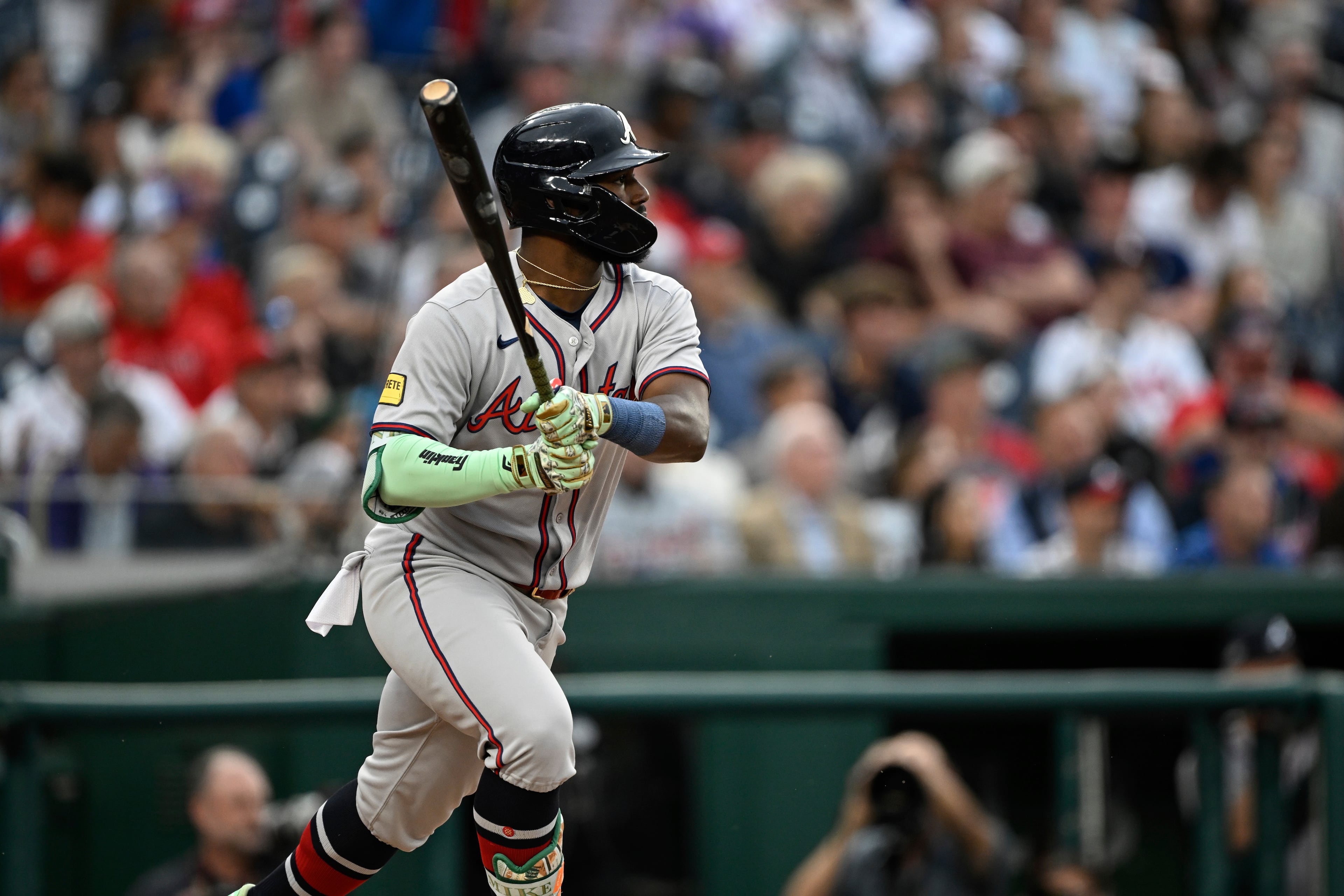 Atlanta Braves Michael Harris II follows through on his RBI double to drive in Eli White against Washington Nationals pitcher Mitchell Parker during the second inning of a baseball game in Washington, Tuesday, May 20, 2025. (AP Photo/Terrance Williams)