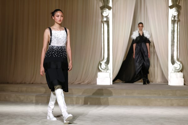 Models wear creations as part of the Chanel Fall-Winter 2025/26 Haute Couture collection presented Tuesday, July 8, 2025, in Paris. (AP Photo/Tom Nicholson)
