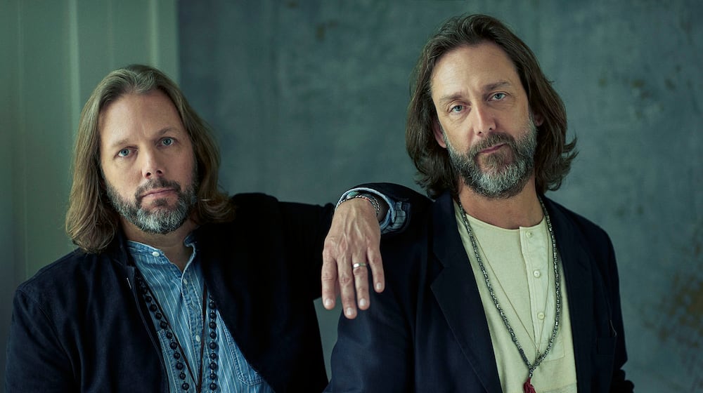 Brothers Rich (left) and Chris Robinson bring their band the Black Crowes to State Farm Arena in October.
(Courtesy of Josh Cheuse)