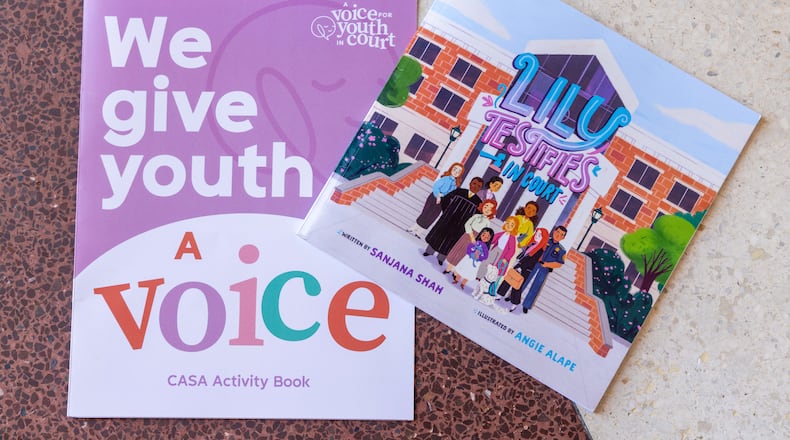 Sanjana Shah, a senior at Johns Creek High School has developed a book and activity book to help foster children navigate juvenile court and just more understand the process. So far its very popular with social workers. PHIL SKINNER FOR THE ATLANTA JOURNAL-CONSTITUTION