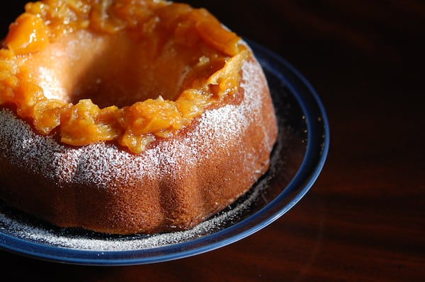 Infused with orange juice and vanilla, and traditionally made with a coin baked inside, vasilopita cake is eaten to celebrate New Year's Day in Greece. It is said that whoever finds the hidden coin will have good luck in the new year. (Meridith Ford for the AJC)