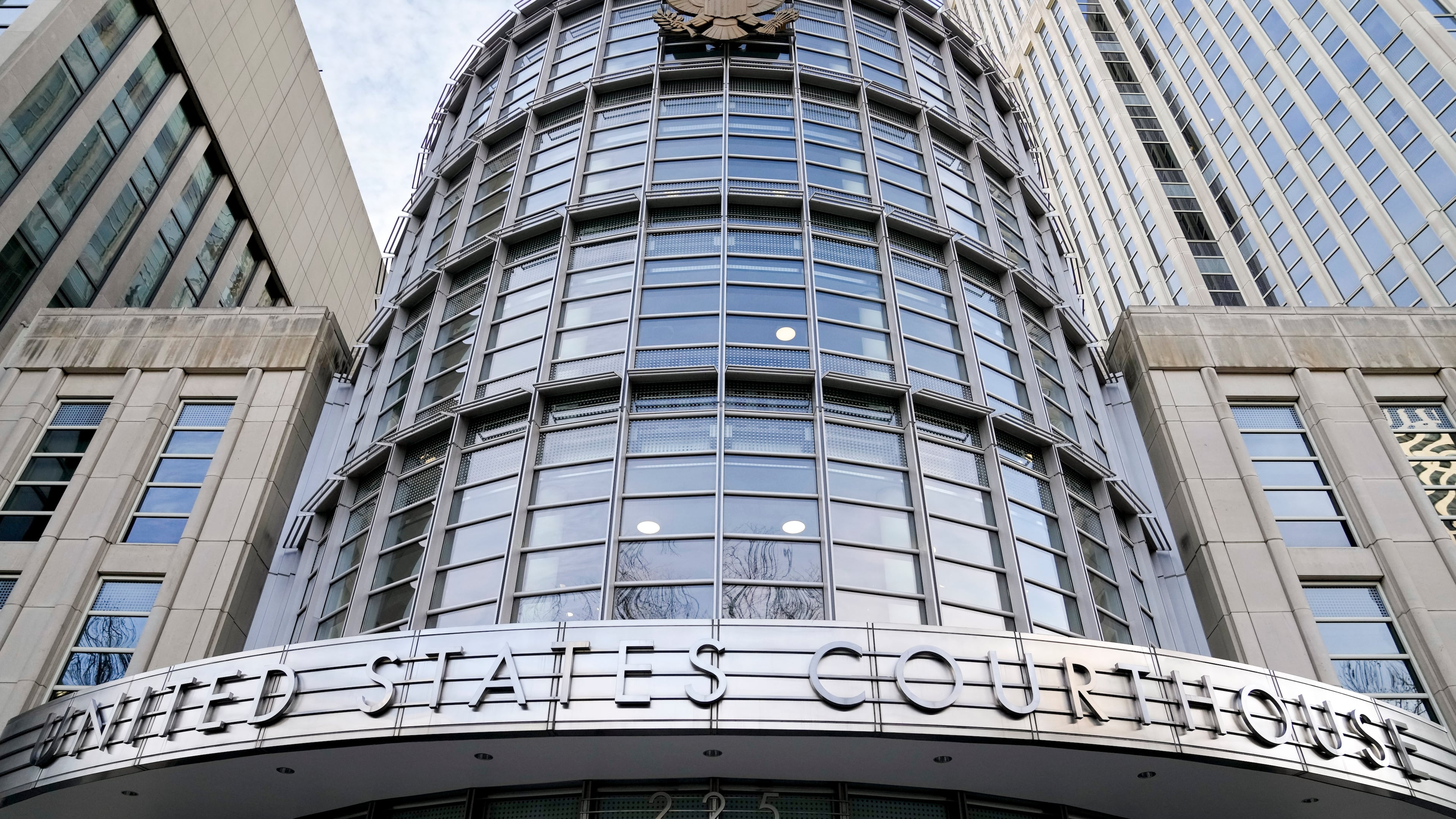 FILE - The seal of the United States is displayed on the facade of Federal court in Brooklyn, Jan. 17, 2023, in New York. (AP Photo/John Minchillo, File)