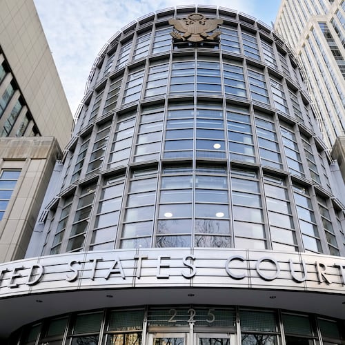 FILE - The seal of the United States is displayed on the facade of Federal court in Brooklyn, Jan. 17, 2023, in New York. (AP Photo/John Minchillo, File)