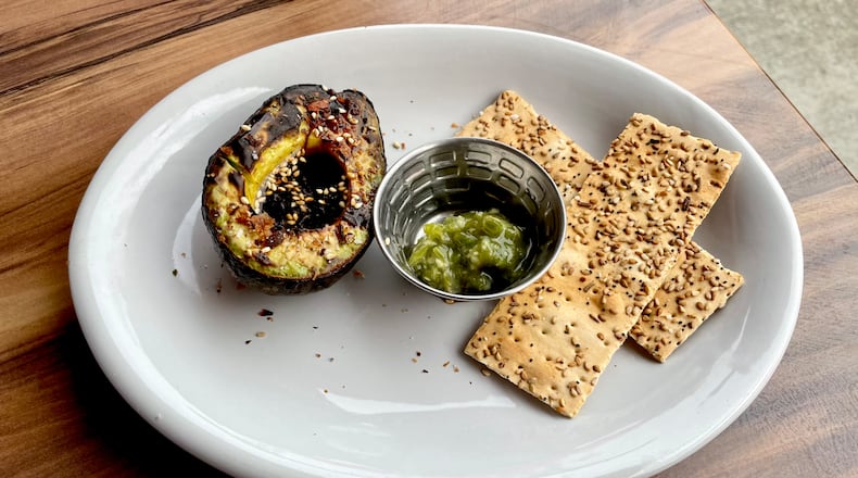 Fire-roasted, creamy avocado is available only at the Toco Hill location of Salaryman. Angela Hansberger for The Atlanta Journal-Constitution