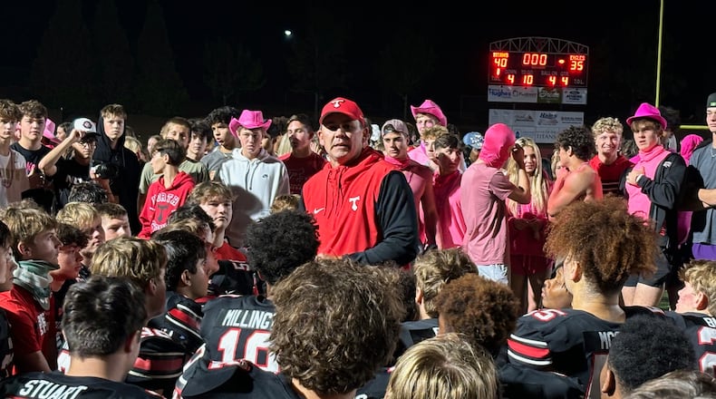 North Oconee coach Tyler Aurandt talks to his players after their 40-35 win over Eastside on Oct. 12, 2024.