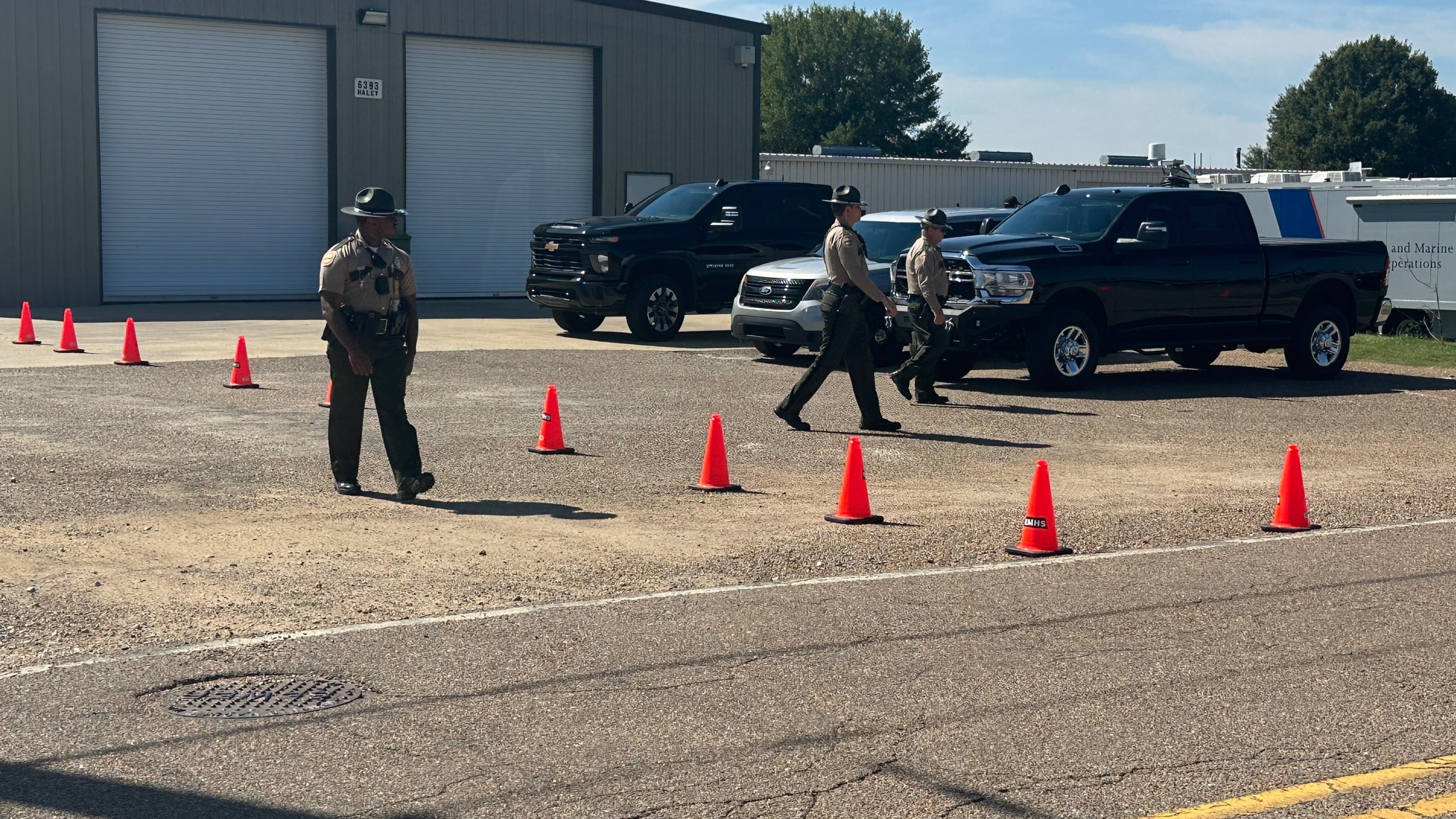 Tennessee Highway Patrol troopers are seen at a staging center for law enforcement on Tuesday, Sept. 30, 2025, in Memphis, Tenn. (AP Photo/Adrian Sainz)