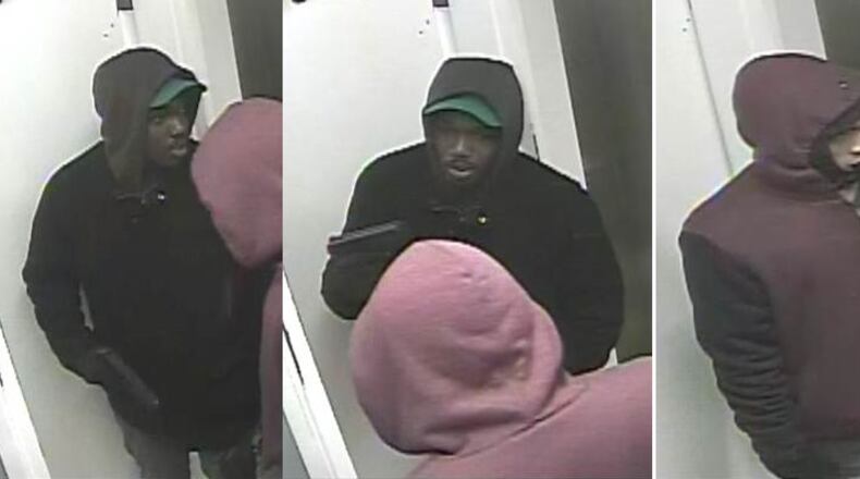 Police seek the men pictured in connection with a restaurant robbery Oct. 31 in Buckhead (Credit: Crime Stoppers).