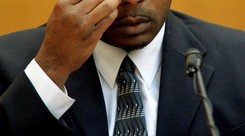 Former Dobbs Elementary teacher Derrick Broadwater becomes emotional as he talks about his students during his testimony on Dec. 17, 2014, in the Atlanta Public Schools test-cheating trial. Broadwater, one of the original defendants in the case, pleaded guilty to reduced charges in January 2014. (Kent D. Johnson, Atlanta Journal-Constitution)