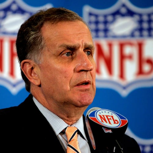 FILE - This May 23, 2006 file photo shows then NFL Commissioner Paul Tagliabue responding to questions during a news conference at the conclusion of the National Football League's owners spring meeting in Denver. (AP Photo/Ed Andrieski, File)