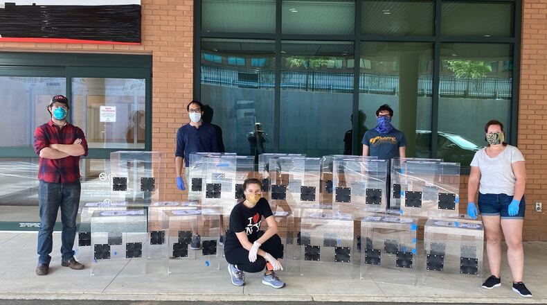 Delivering the intubation boxes to Wellstar Kennestone Hospital are, from left, Cameron Mills, Adna Muliawan, Madi Anderson, Chris Chapman and Rachael Beck. Photo contributed by The Weber School.