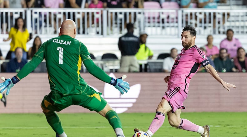 Inter Miami forward Lionel Messi (10) tries to score against Atlanta United goalkeeper Brad Guzan (1) in the second half at Chase Stadium on Friday, Oct. 25, 2024, in Fort Lauderdale, Florida. (Matias J. Ocner/Miami Herald/TNS)