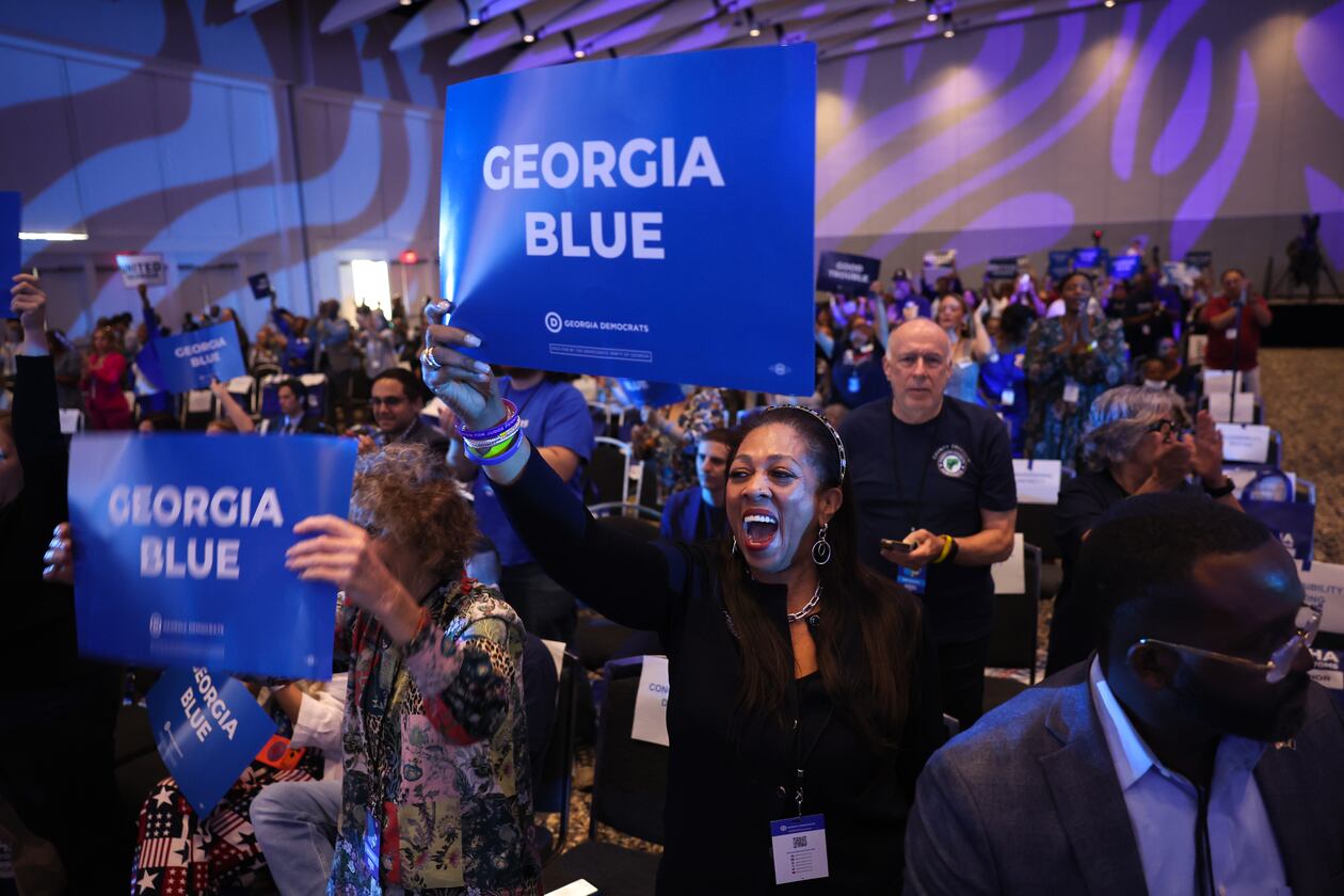 Cassandra Littlejohn cheers at the Georgia Democratic Convention at the Savannah Convention Center in Savannah on Saturday, Aug. 1, 2026. (Arvin Temkar/AJC)