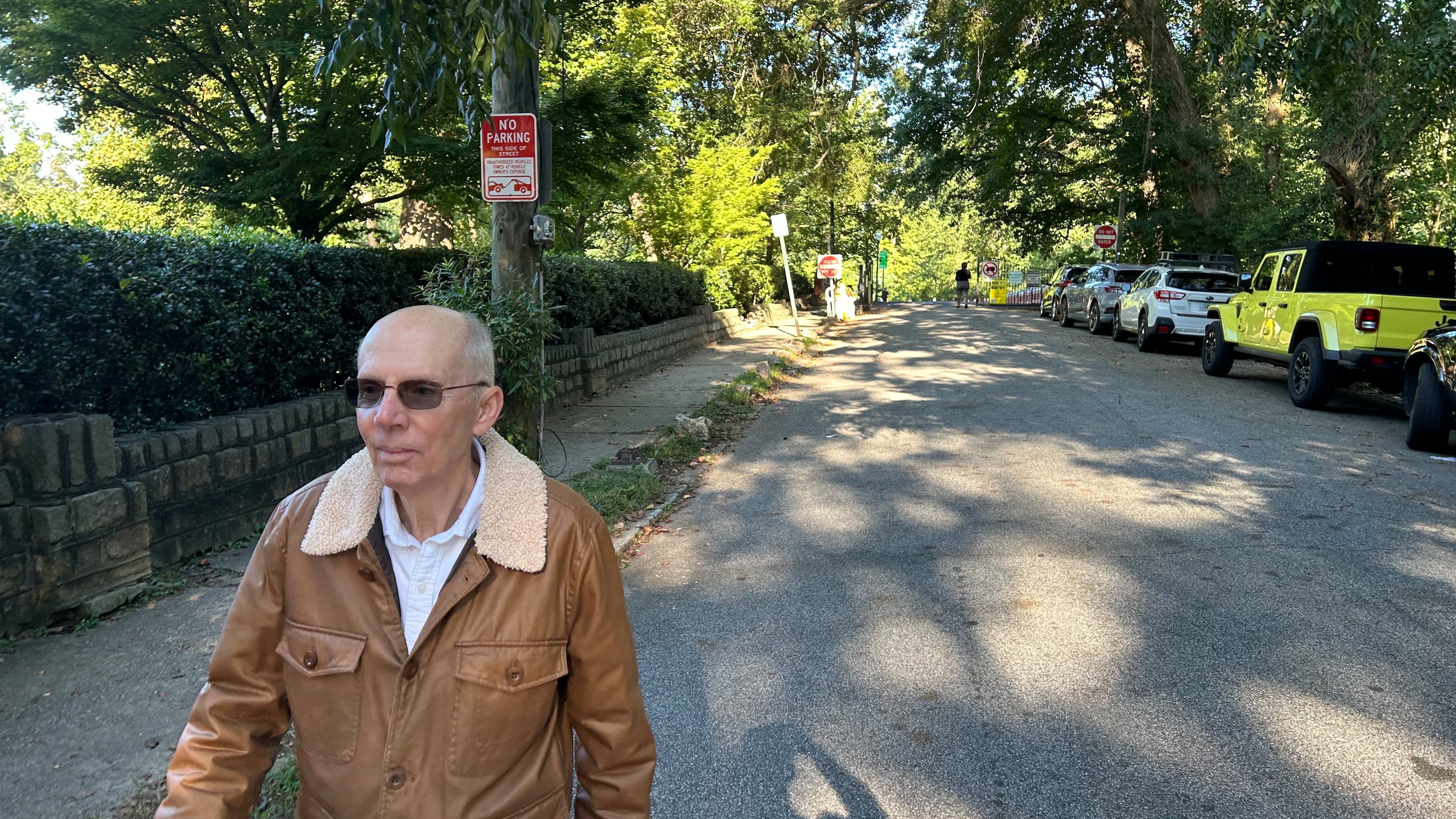 Bruce Weber, 77, wore a jacket on his walk through Piedmont Park on Wednesday morning. (Thomas Lake/AJC)