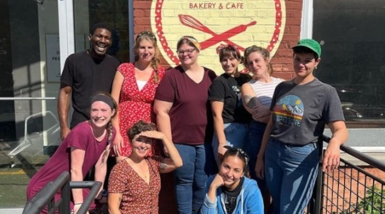 To cover health care costs, owner Sarah O’Brien (front row, second from left) has added a 4% pre-tax fee to transactions at her Little Tart Bakeshop locations and farmers market stalls, as well as her Big Softies ice cream shop. Courtesy of Madi Bolton/Little Tart Bakeshop