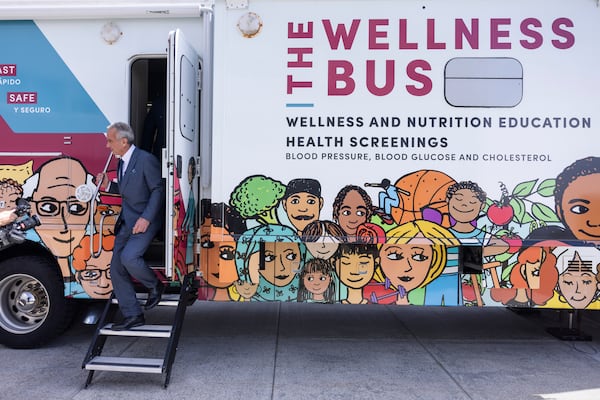 Health Secretary Robert F. Kennedy Jr. exits a bus as he visits University of Utah to discuss Utah's new fluoride ban and food additives legislation, Monday, April 7, 2025, in Salt Lake City. (AP Photo/Melissa Majchrzak)