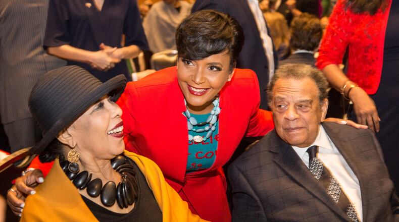 Keisha Lance Bottoms, Mayor of Atlanta (center) poses with Caroline Young and Ambassador Andrew Young at the State of the City Business Breakfast at the Georgia World Congress Center in Atlanta on Tuesday. (Photo by Phil Skinner)
