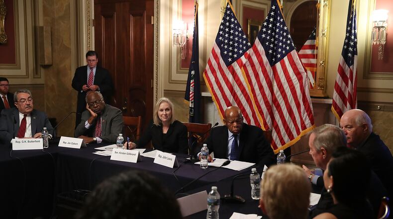 WASHINGTON, DC - SEPTEMBER 21: Sen. Kirsten Gillibrand (D-NY), (3rd L), hosts a a discussion with members of Congress on the state of voting rights in America, on Capitol Hill September 21, 2016 in Washington, DC. Also pictured are Rep. G.K. Butterfield (D-NC), (L), and Rep. James Clyburn (D-SC), (2nd L), Rep. John Lewis (D-GA), (C), Sen. Ben Cardin (D-MD), (R), and Sen. Dick Durbin (D-IL), (2nd R). (Photo by Mark Wilson/Getty Images)