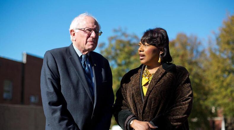 Democratic presidential candidate Sen. Bernie Sanders, I-Vt., left, meets with Dr. Bernice King, daughter of the Rev. Martin Luther King Jr., during a visit to The King Center Monday, Nov. 23, 2015, in Atlanta. (AP Photo/David Goldman)