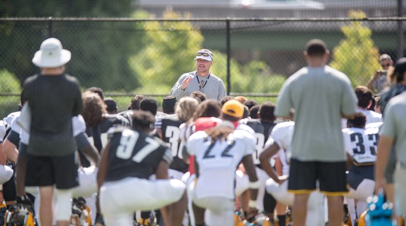 Kennesaw State coach Brian Bohannon speaks with his team. (Photo courtesy of KSU Sports Information)