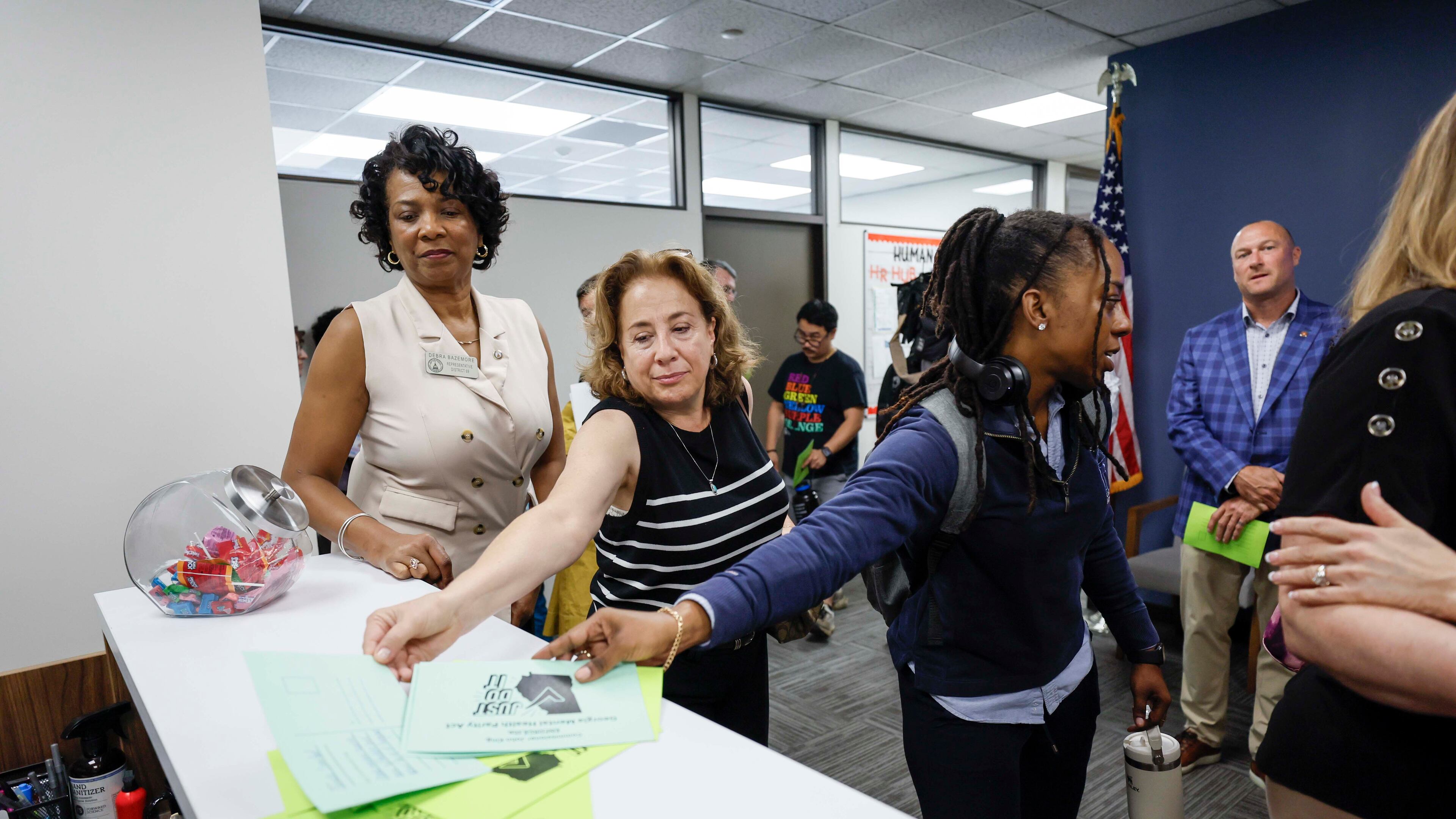 Mental health advocates and leaders gathered in the Sloppy Floyd Capitol Room at the Office of the Commissioner of Insurance and Safety Fire to deliver postcards supporting equal insurance coverage for mental health care on Monday, August 18, 2025.
(Miguel Martinez/ AJC)