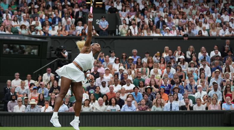 Serena Williams of the United States serves against Maya Joint of Australia in their first round women's singles match at the Wimbledon Tennis Championships in London, Tuesday, June 30, 2026. (AP Photo/Maja Smiejkowska)