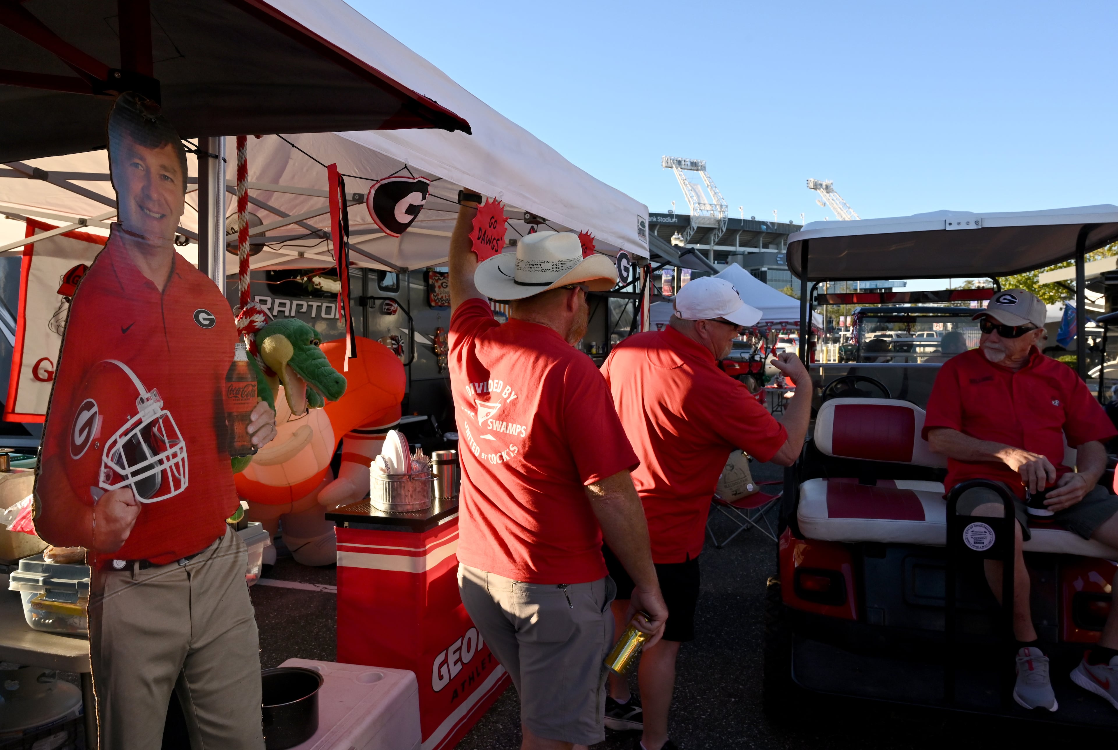Georgia fans enjoy tailgating ahead of the NCAA football game Saturday between Georgia and Florida in RV City outside EverBank Stadium, Friday, October 31, 2025, Jacksonville, Fla. (Hyosub Shin / AJC)