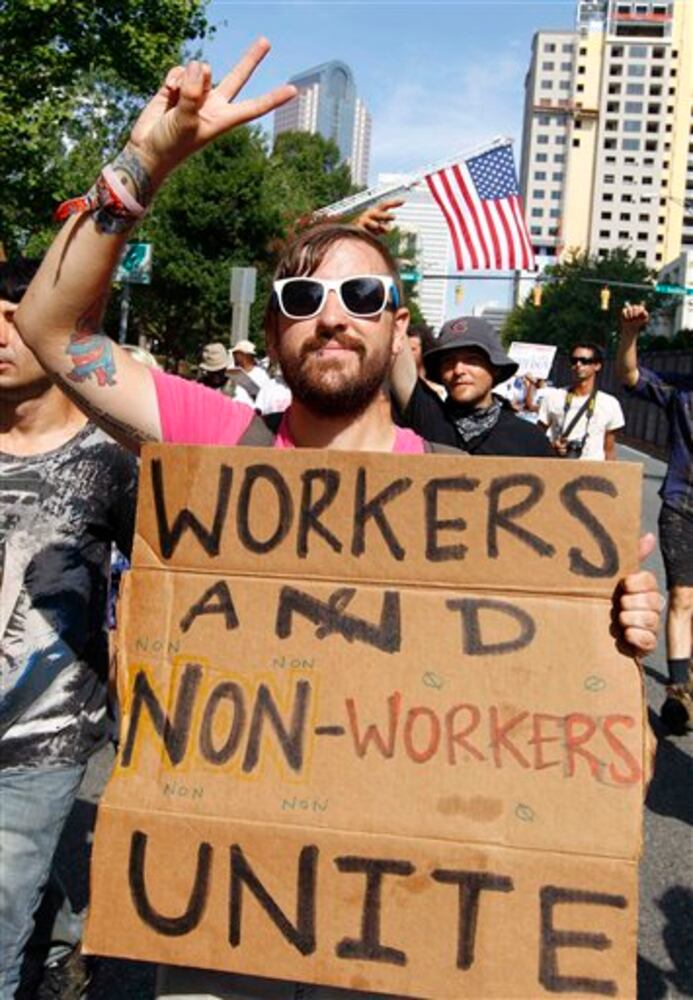 Signs seen for and against DNC in Charlotte