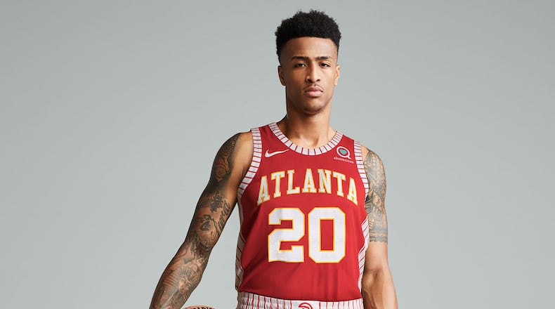 John Collins models the uniform the Hawks will wear Saturday night. (Photo courtesy of the Atlanta Hawks).