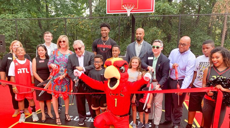The Atlanta Hawks and State Farm opened two new basketball courts and a "Good Neighbor Club" recreation center at Lucky Shoals Park.