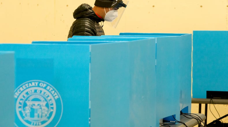 A voters casts his ballots at the Coan Park Recreation Center on election day Nov. 3, 2020. PHIL SKINNER FOR THE ATANTA JOURNAL-CONSTITUTION