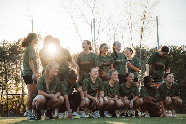 Members of the Speedy Turtles, an Atlanta-based team participating in this week's The Soccer Tournament in Cary, N.C., pose for a photo.