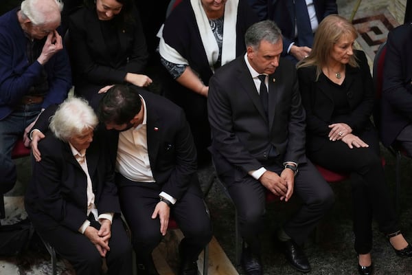 Chile's President Gabriel Boric offers condolences to Lucia Topolansky, widow of former Uruguayan President Jose Mujica, during funeral ceremonies at the Legislative Palace in Montevideo, Uruguay, Thursday, May 15, 2025. Second from right is Uruguayan President Yamandu Orsi and his wife Laura Alonsopere, right. I(AP Photo/Matilde Campodonico)