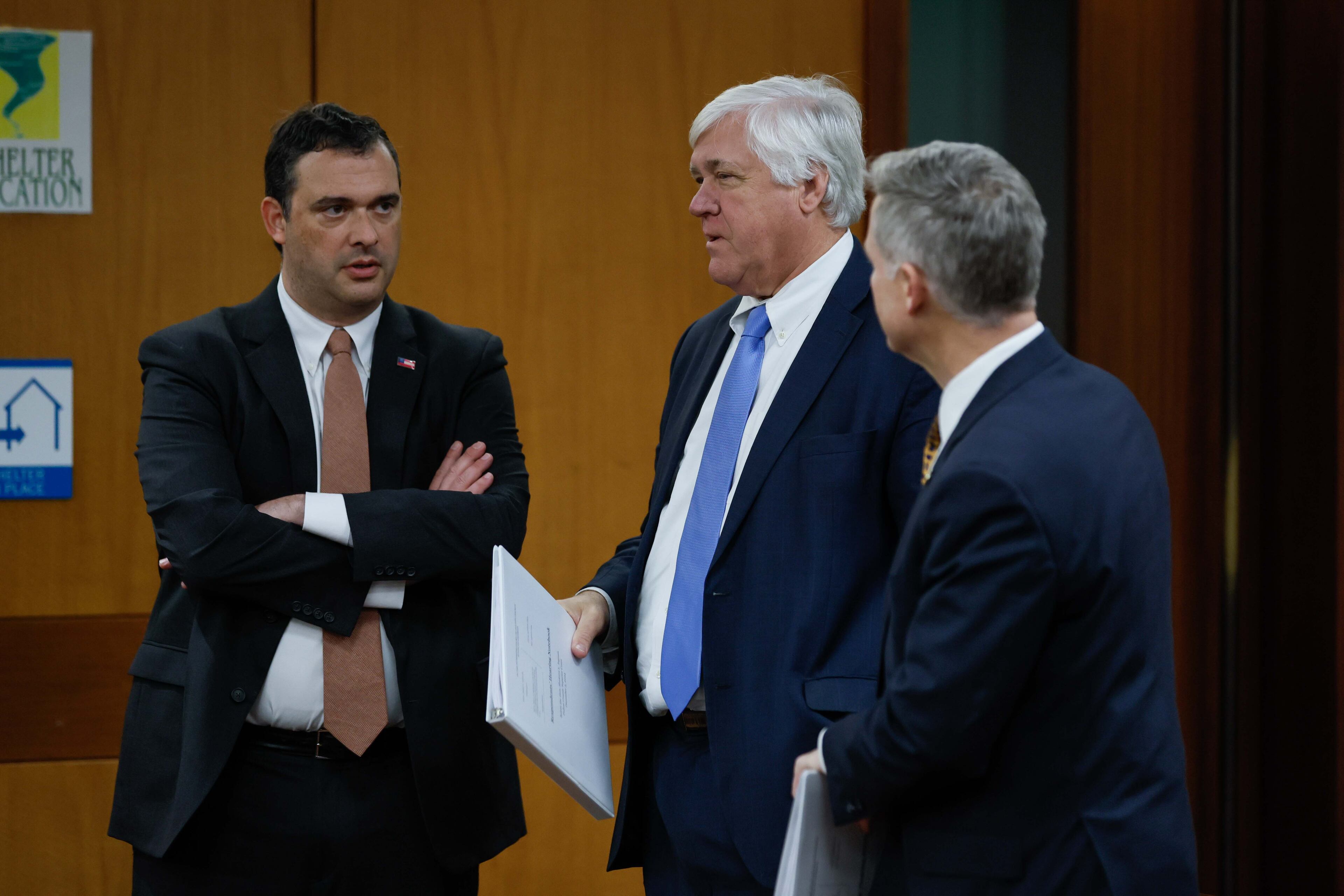 Attorney Josh Belinfante (from left) speaks with Sens. Bill Cowsert and John Kennedy before a hearing in Fulton County Superior Court on Tuesday, Dec. 3, 2024, in Atlanta. (Miguel Martinez/AJC 2024)