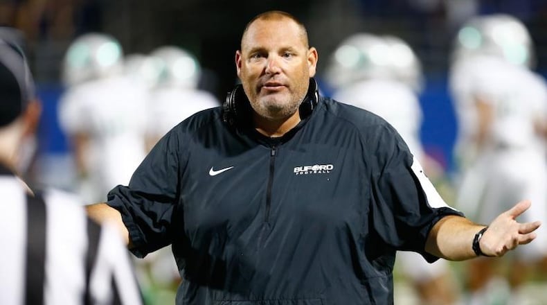 Jess Simpson coach Buford High to seven state titles.
