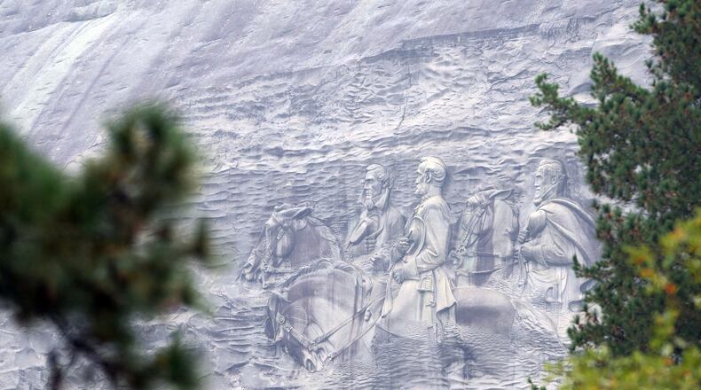 The controversy over Confederate history is attracting known white supremacists to a rally planned at Stone Mountain Park in April 2016. KENT D. JOHNSON/KDJOHNSON@AJC.COM