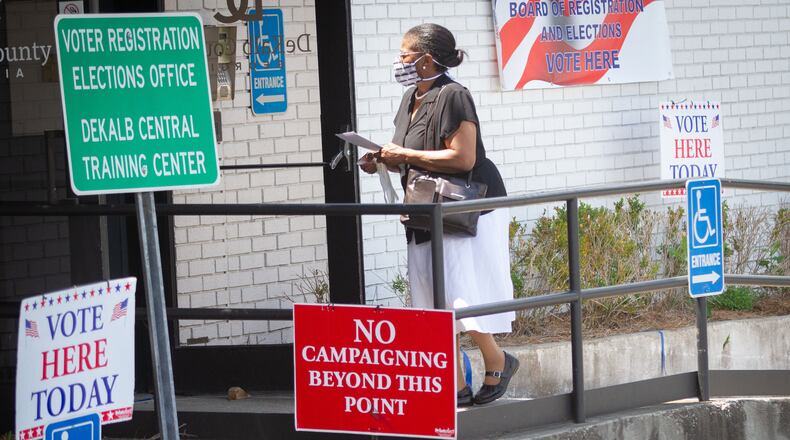 A woman walks into the Dekalb County Voter Registration & Elections Office to vote in Decatur  Saturday, May 30, 2020. STEVE SCHAEFER FOR THE ATLANTA JOURNAL-CONSTITUTION