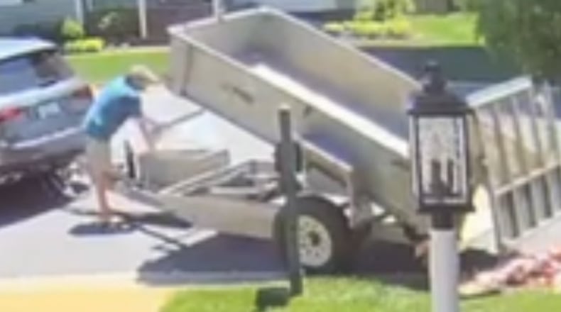 Home security footage shows the moment when a Virginia father made his final child support payment to his ex-wife last month by dumping a trailer filled with 80,000 pennies onto her front lawn, according to reports.