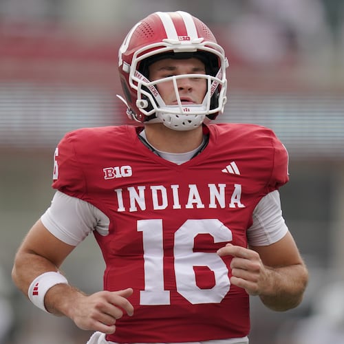 Indiana quarterback Alberto Mendoza — pictured warming up against Michigan State in October — has entered the transfer portal, and Georgia Tech is reportedly "among the early teams to watch" for adding him. (Vera Nieuwenhuis/AP 2025)