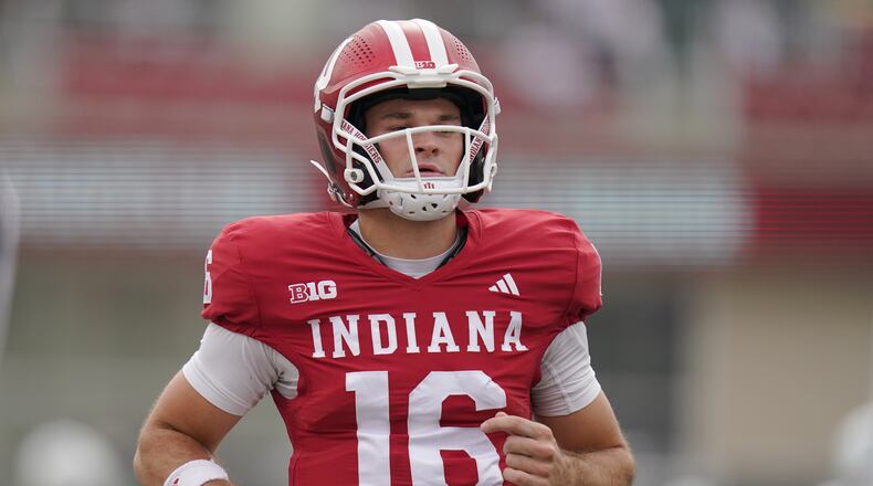 Indiana quarterback Alberto Mendoza — pictured warming up against Michigan State in October — has entered the transfer portal, and Georgia Tech is reportedly "among the early teams to watch" for adding him. (Vera Nieuwenhuis/AP 2025)