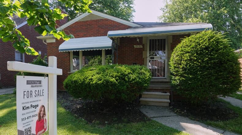 An existing home for sale is shown Tuesday, July 7, 2026, in Detroit. (AP Photo/Paul Sancya)