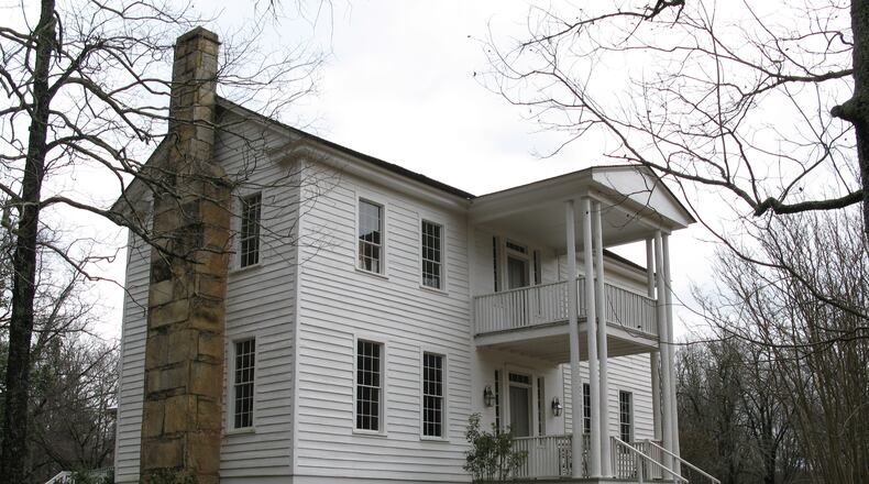 The Elisha Winn House, see here in 2010, was also the site of the county's first courthouse and election. Today it's surrounded by a golfing community. The Gwinnett Historical Society manages the house and hosts a fundraiser each year to keep their restoration efforts going. (Gwinnett Historical Society)