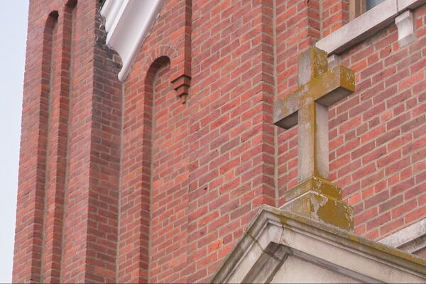 This photo provided by WKRC-TV shows St. Anthony of Padua Church, where a Communion wafer with red marks was discovered, in Morris, Ind. (WKRC-TV via AP)