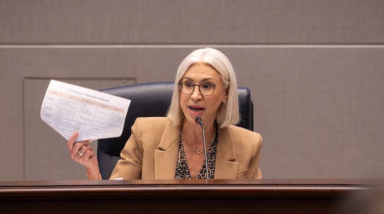 Fulton County Commissioner Dana Barrett said an unusually high number of land packages led to a delay in certifying the 2026 tax digest. Officials are asking a judge to grant a temporary collection order so they can pay bills, including employees' salaries. (Ben Hendren for the AJC)